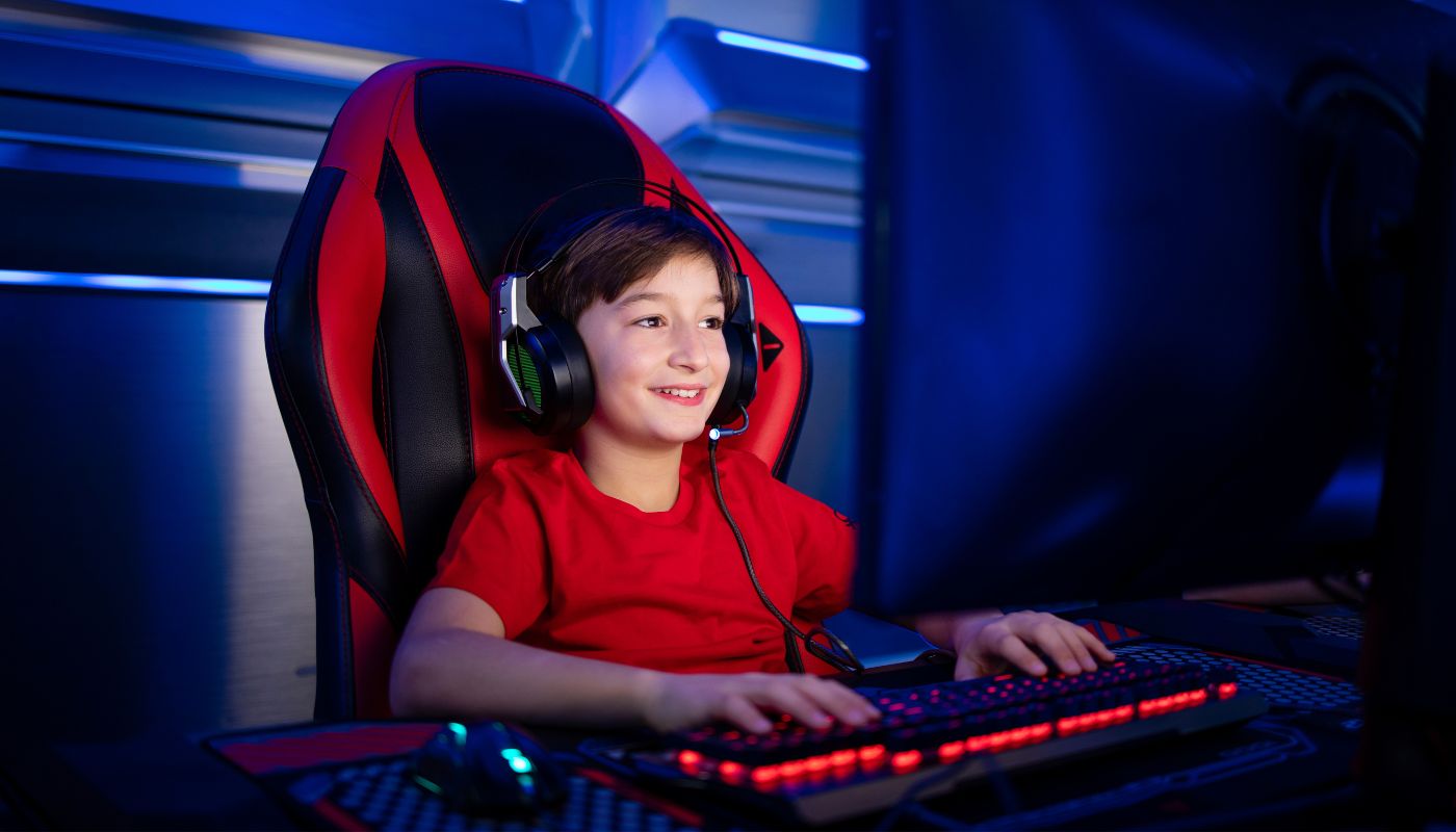 Kid playing a video game discount